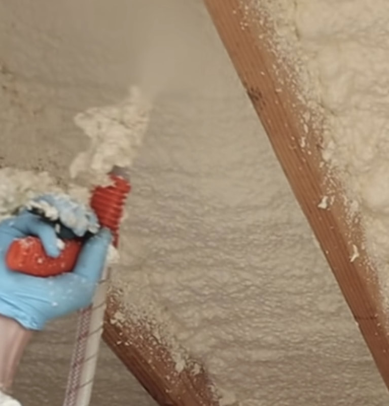 spraying closed cell foam insulation in attic